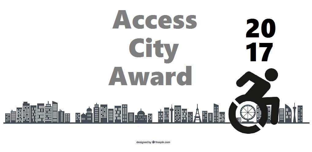 skyline di città con palazzi e carrozzina. Scritta in nero centrale "access city award 2017"
