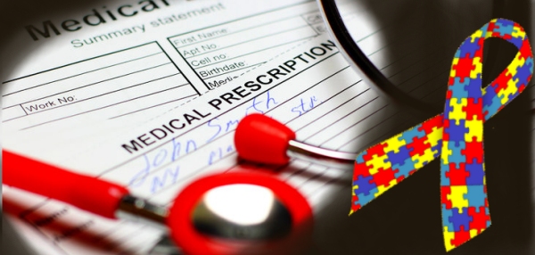 documenti medici in secondo piano rispetto al fiocco rappresentativi dei disturbi dello spettro autistico