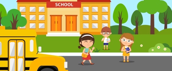 immagine di alcuni bambini davanti alla scuola con il bus di lato