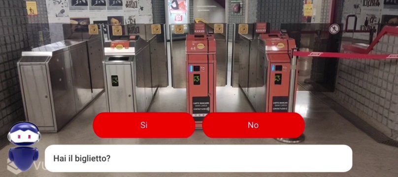 schermata di uno schermo che mostra istruzioni ad una persona davanti ai tornelli della metropolitana