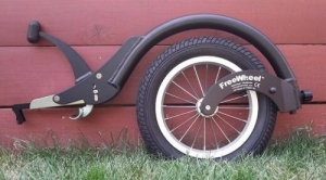 Il ruotino per carrozzine Freewheel e le ruote mountain bike per andare su sabbia, neve e erba con la sedie a rotelle